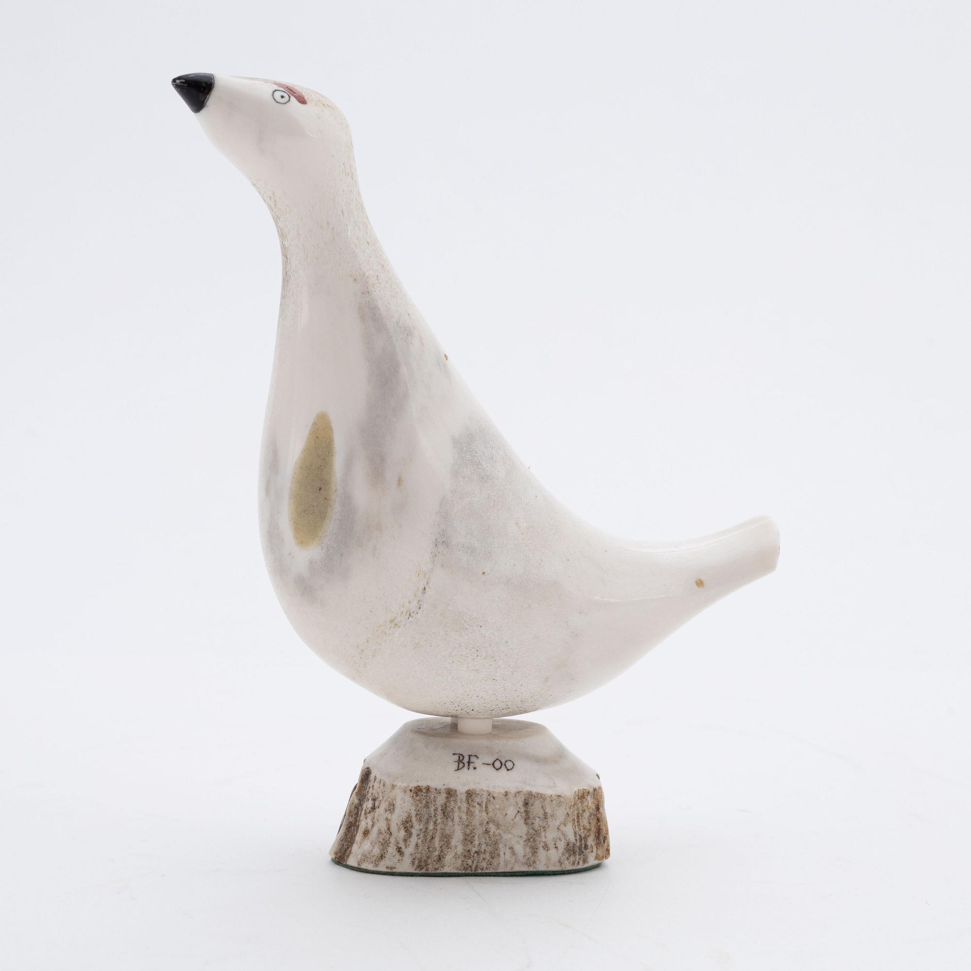 A reindeer horn figurine by Bertil Fällman, signed and dated -00.