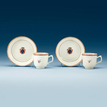 1554. A pair of armorial cups with saucers, Qing dynasty, Qianlong (1736-95).