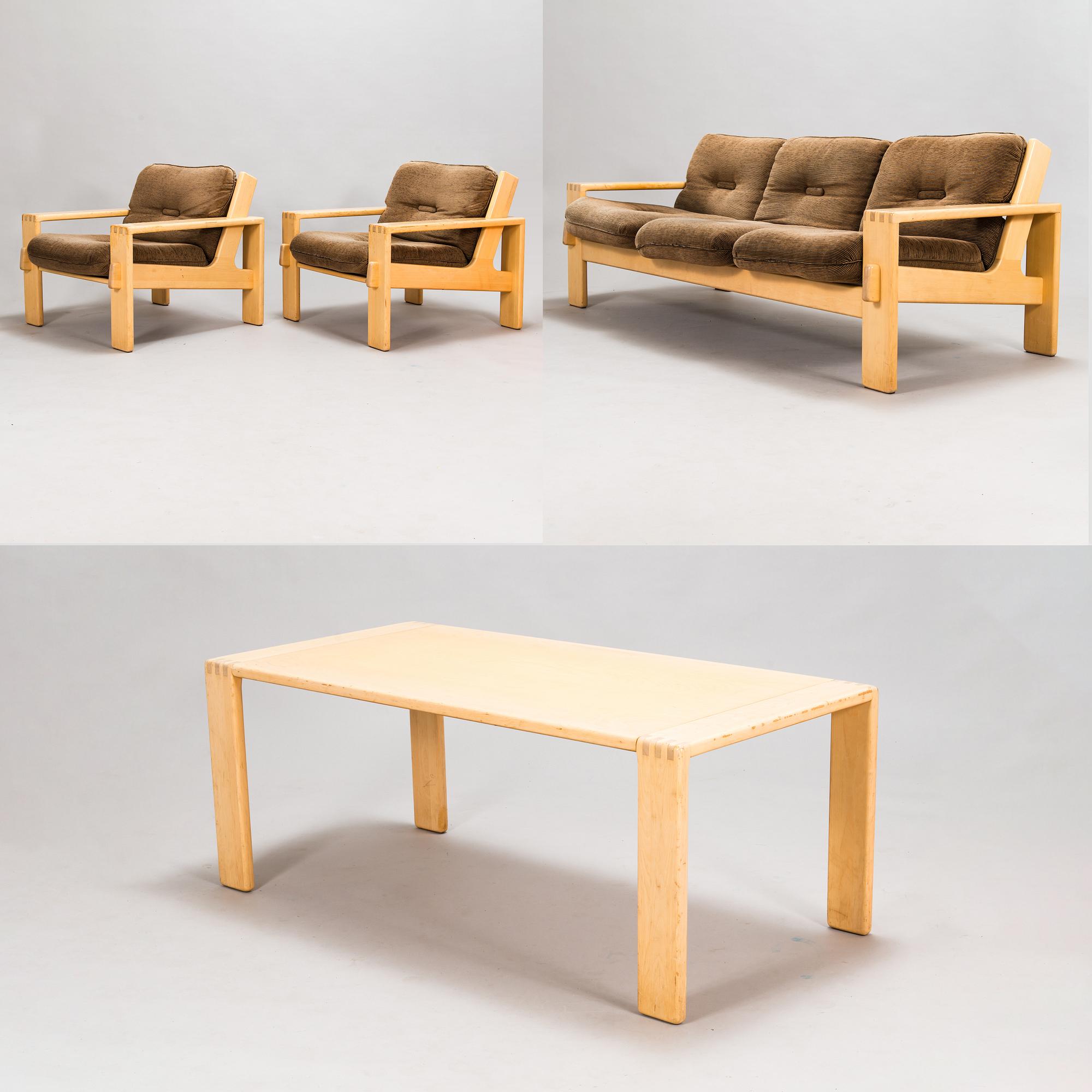 Esko Pajamies, A pair of 1970's 'Bonanza' armchairs, coffee table and sofa for Asko.