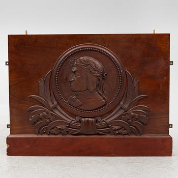 A mahogany panel, 20th century.