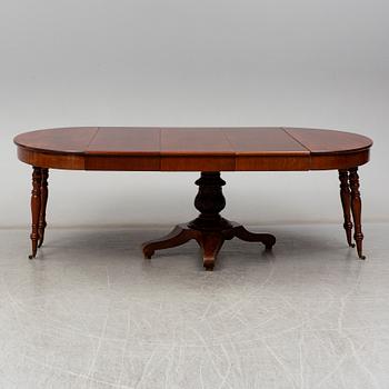 A late Empire Dinner table, 19th century.