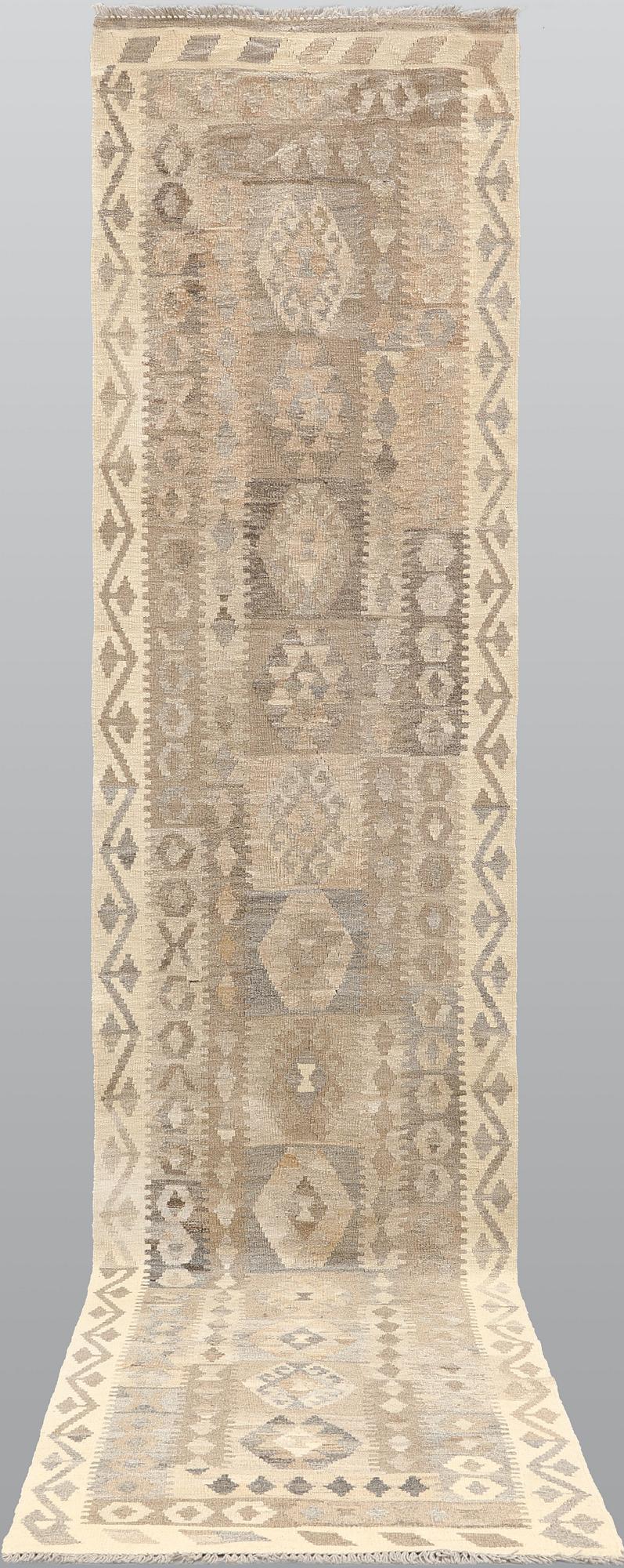 A Kilim runner, approx. 488 x 88 cm.