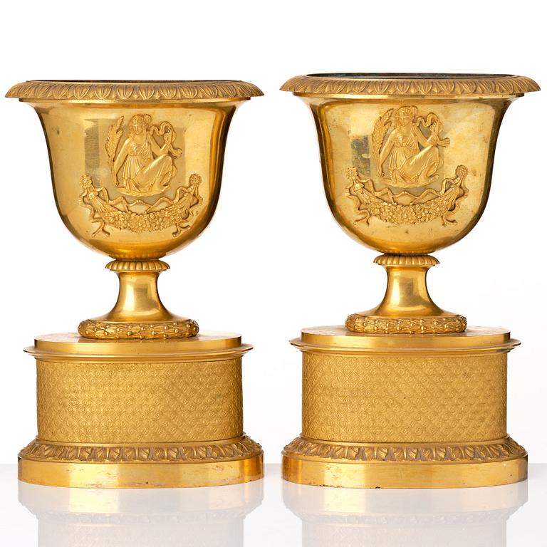 A set of three French Empire early 19th century gilt bronze centre pieces.