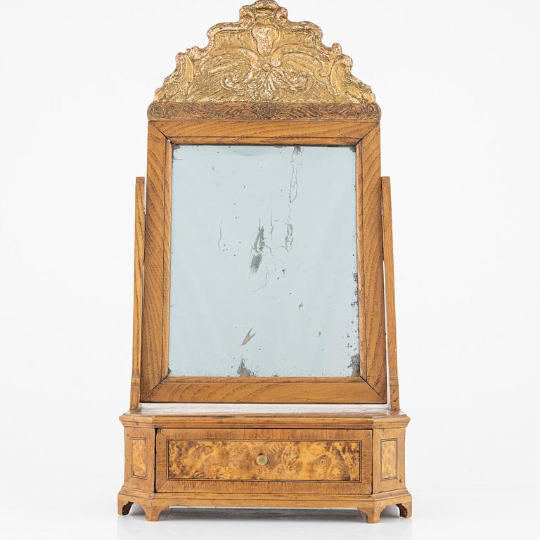 A Gustavian mirror, signed 'Fecit Olof Hallden d 1 junü 1791'.