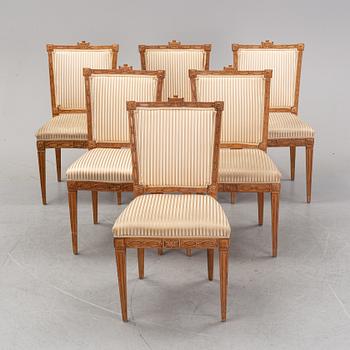 Six Louis XVI style oak chairs from around the year 1900.