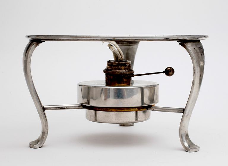 A Svenskt Tenn pewter sauce pot on stand with a heater, Stockholm 1950 and 1954.