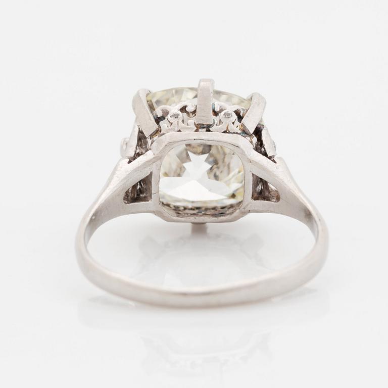 A platinum ring set with an old-cut diamond.