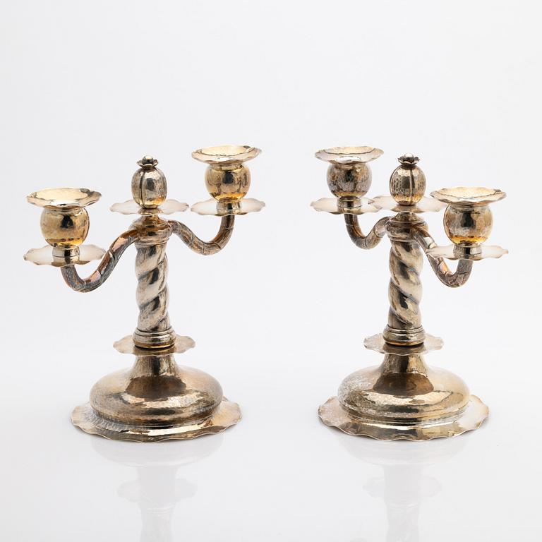 C.G. Hallberg, Pair of candelabra, silver, Stockholm, 1927.