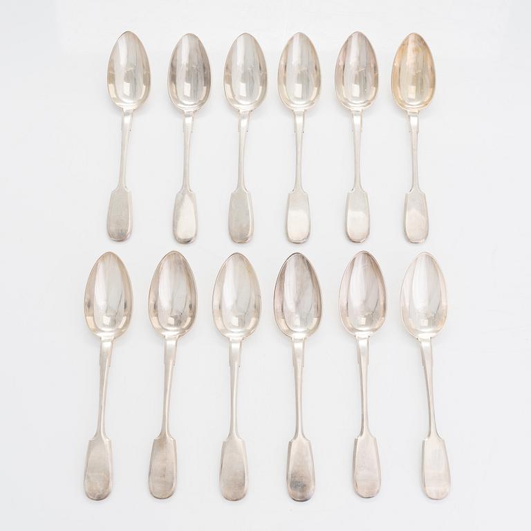 A set of 12 Morozov silver table spoons, master Adam Herttuainen. Imperial Warrant. St Petersburg 1908-17. In oak box.