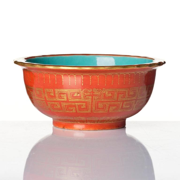 A coral red ground and gilt decorated turquoise enamelled bowl, Qing dynasty, Daoguang mark and period (1821-50).