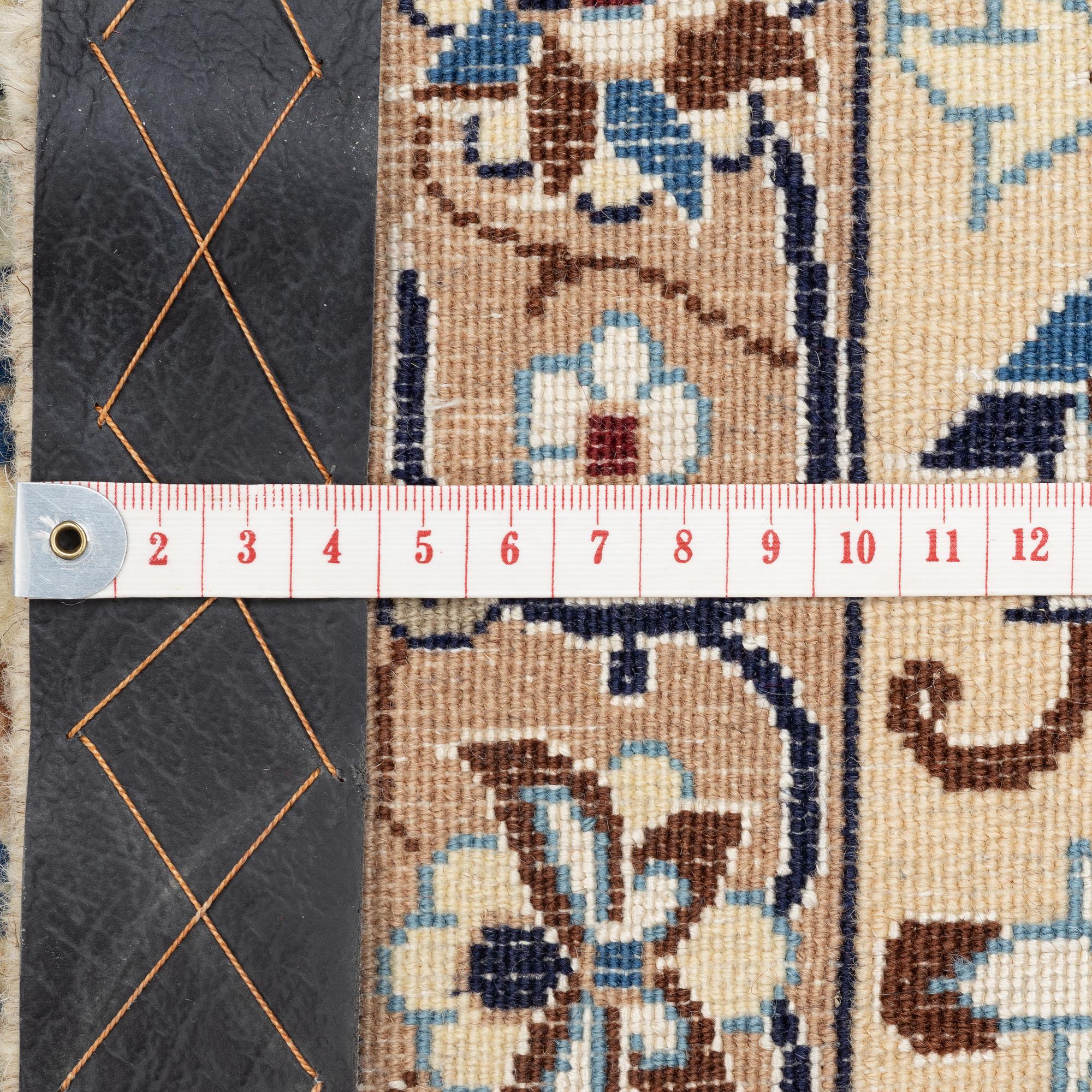 Rug, Nain, part silk, approx. 300 x 203 cm.