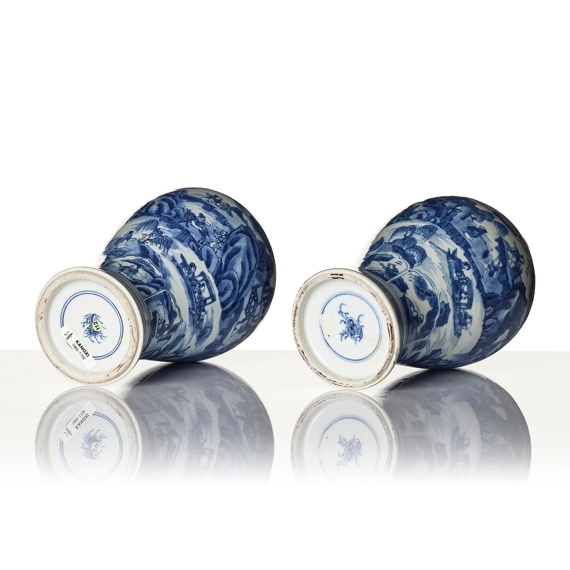 A pair of blue and white 'landscape' vases, Qing dynasty, Kangxi (1662-1722).