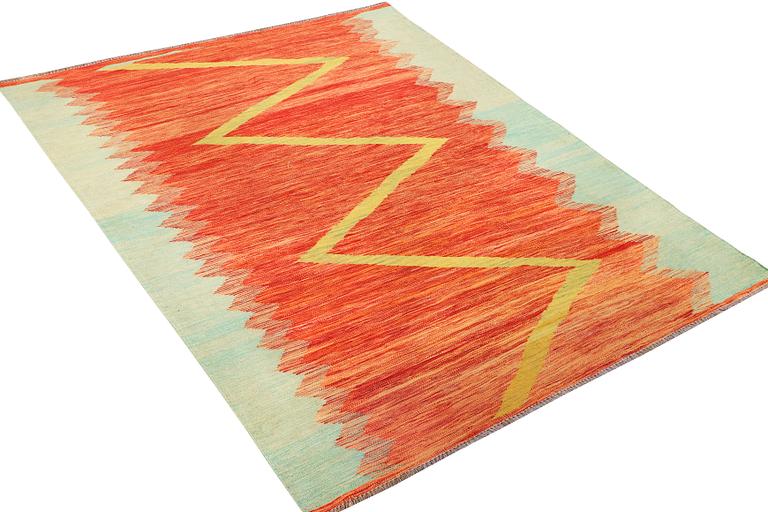 A Kilim rug, a. 246 x 174 cm.