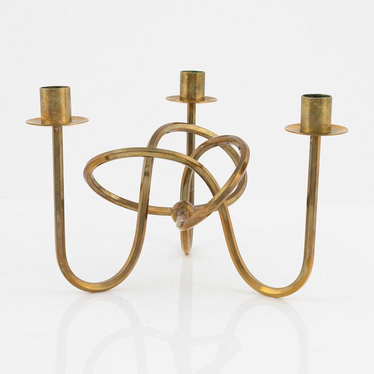 Josef Frank, a brass candelabrum, model 'Vänskapsknuten', Firma Svenskt Tenn, Sweden.