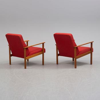 A pair of circa 196s easy chairs.