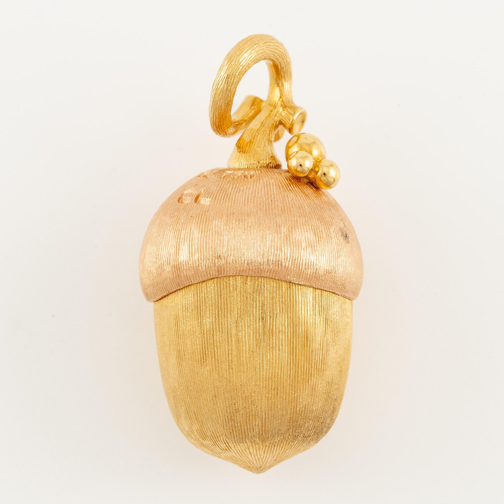 An Ole Lynggaard pendant in 18K gold in two colours with a round brilliant-cut, "Forest Pendant".