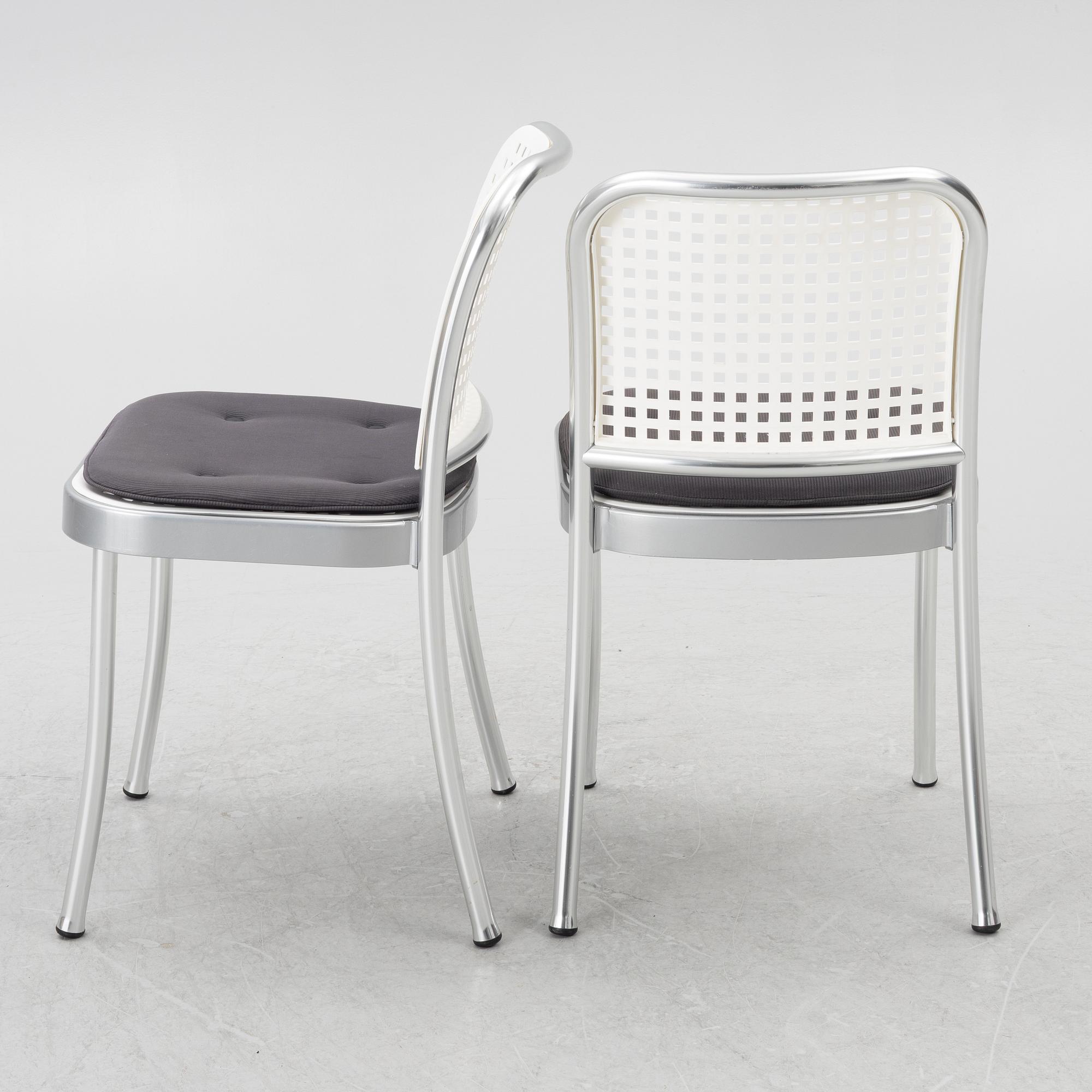 Vico Magistretti, a "Shine" dining table with twelve chairs, De Padova, Italy, around the year 2000.