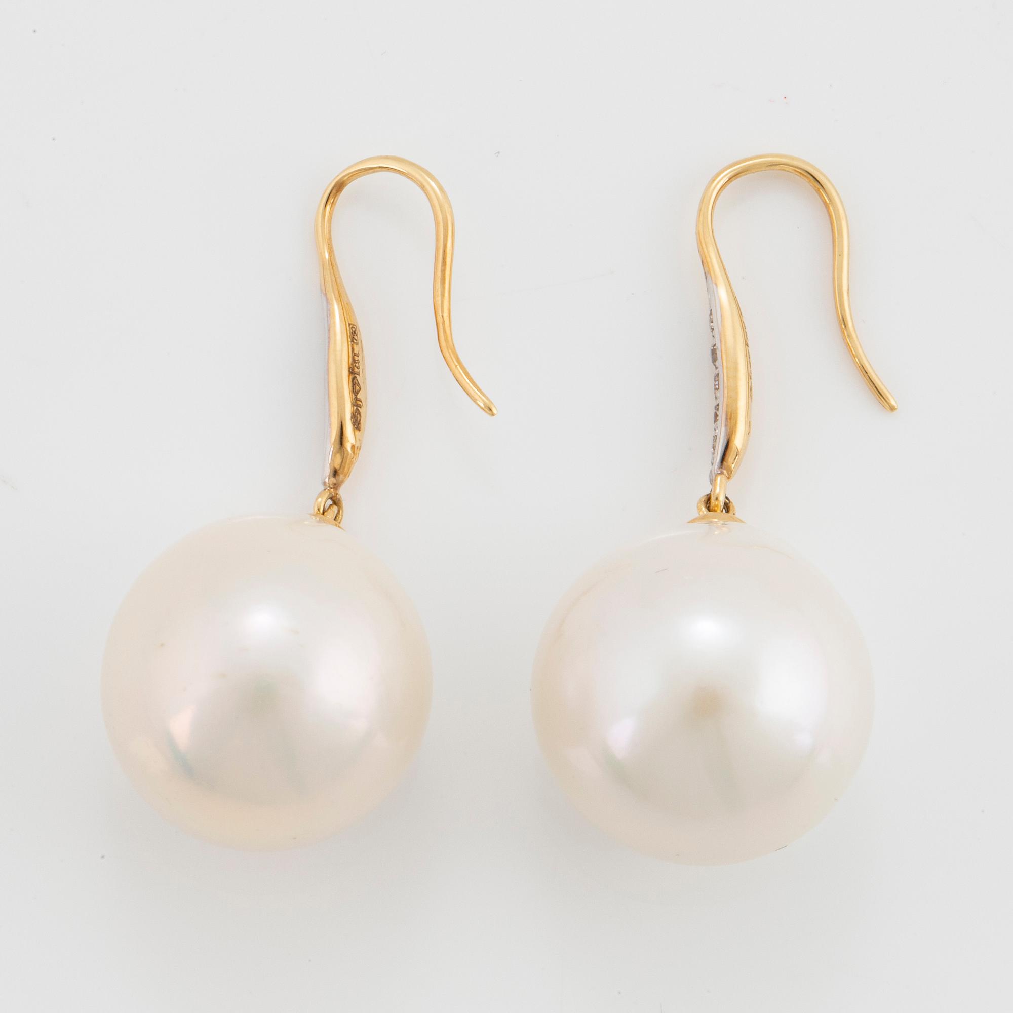 Cultured freshwater pearl and diamond earrings.