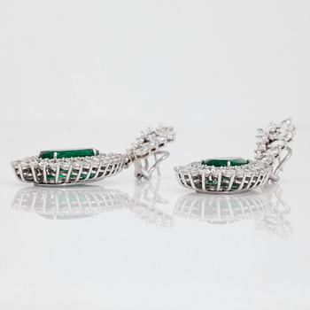 A pair of zambian emerald and diamond earrings.