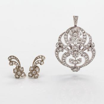 An 18K white gold pendant and earrings with diamonds ca. 2.00 ct in total. G. Dahlgren, Malmoe 1947.