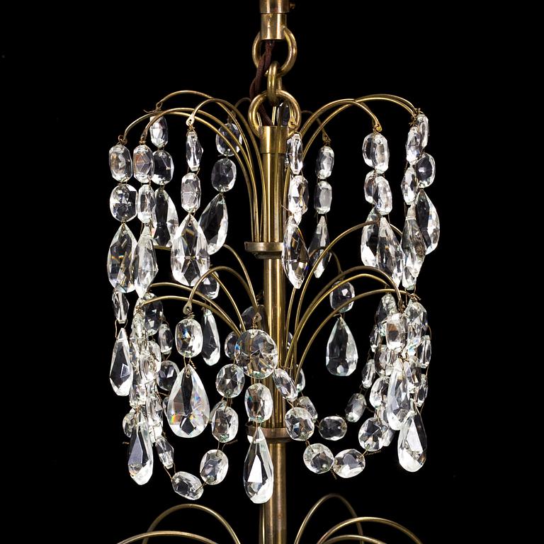A mid-20th century, baroque style chandelier.