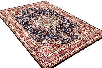 A Hamadan carpet, c. 312 x 216 cm.
