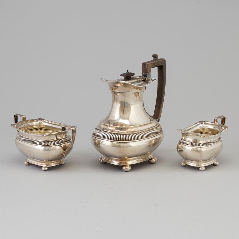 A three piece silver coffee set by The Alex Clark Company, London, first half of the 20th century.