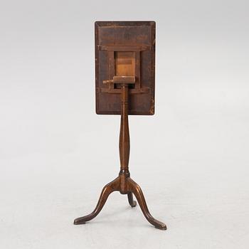 A folding table, early 19th century.