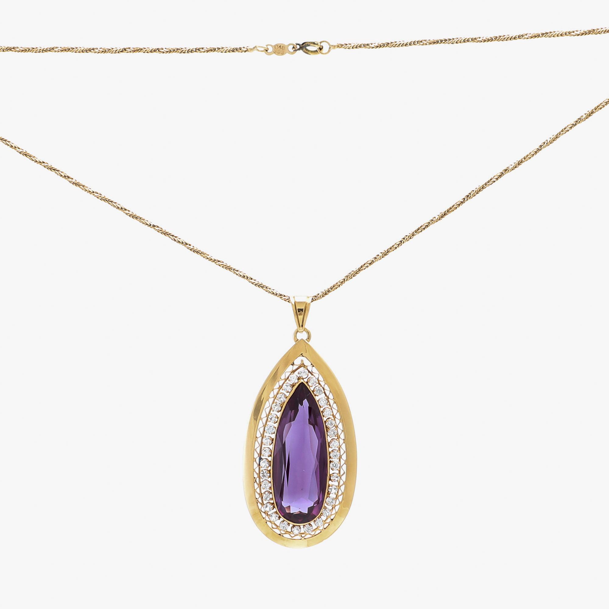 Necklace 18K and 14K gold with faceted synthetic purple sapphire.