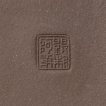 A group of four square yixing teapots, China, 1970/80s.