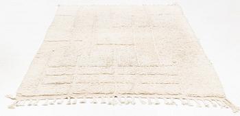 A Moroccan carpet, circa 308 x 181 cm.