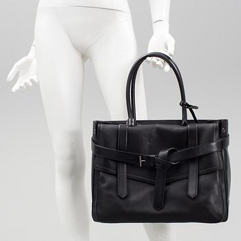 A handbag Reed Kaakoff.
