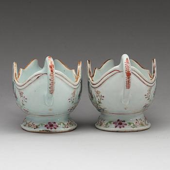 A pair of famille rose 'double peacock' sauce boats, Qing dynasty, Qianlong (1736-95).