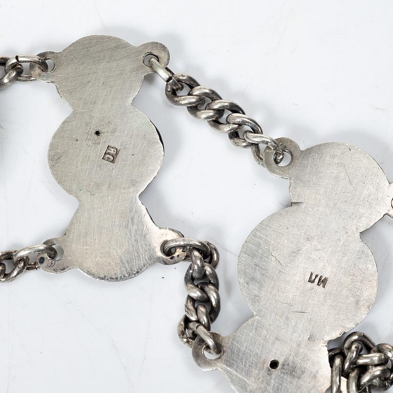 Belt/waistband and two brooches, silver, Russia 1896–1908.