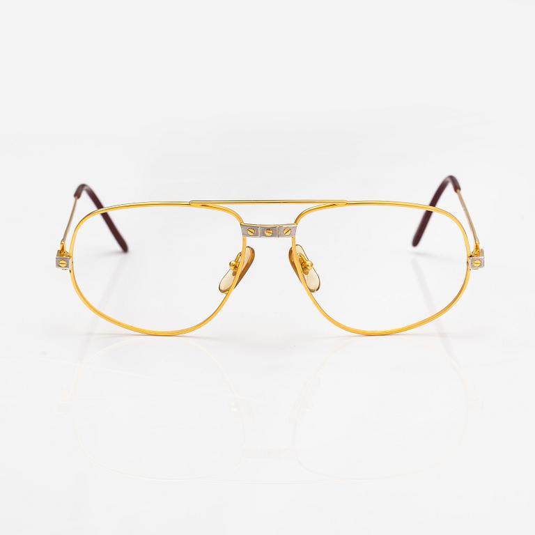 must de Cartier, Santos, a pair of eyeglass frames. Marked Cartier, Paris, Made in France 135, 56, 16.