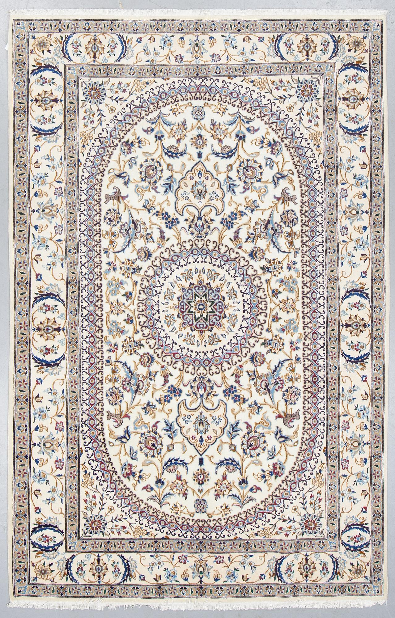 A carpet, Nain, part silk, ca 296 x 192 cm.