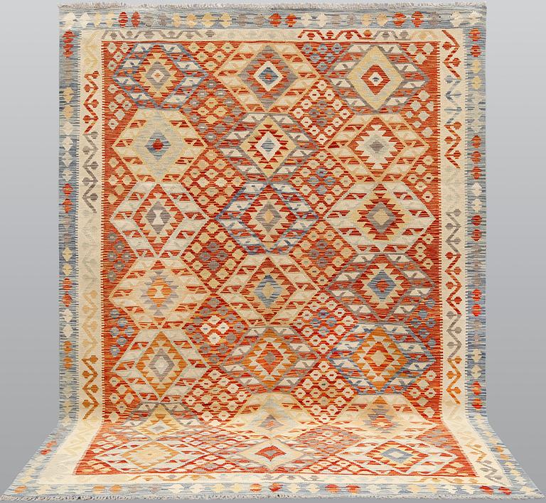 A Kilim carpet, ca 290 x 215 cm.