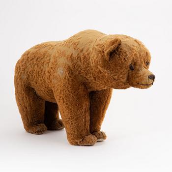 A toy bear, possibly Steiff, first half  of the  20th century.