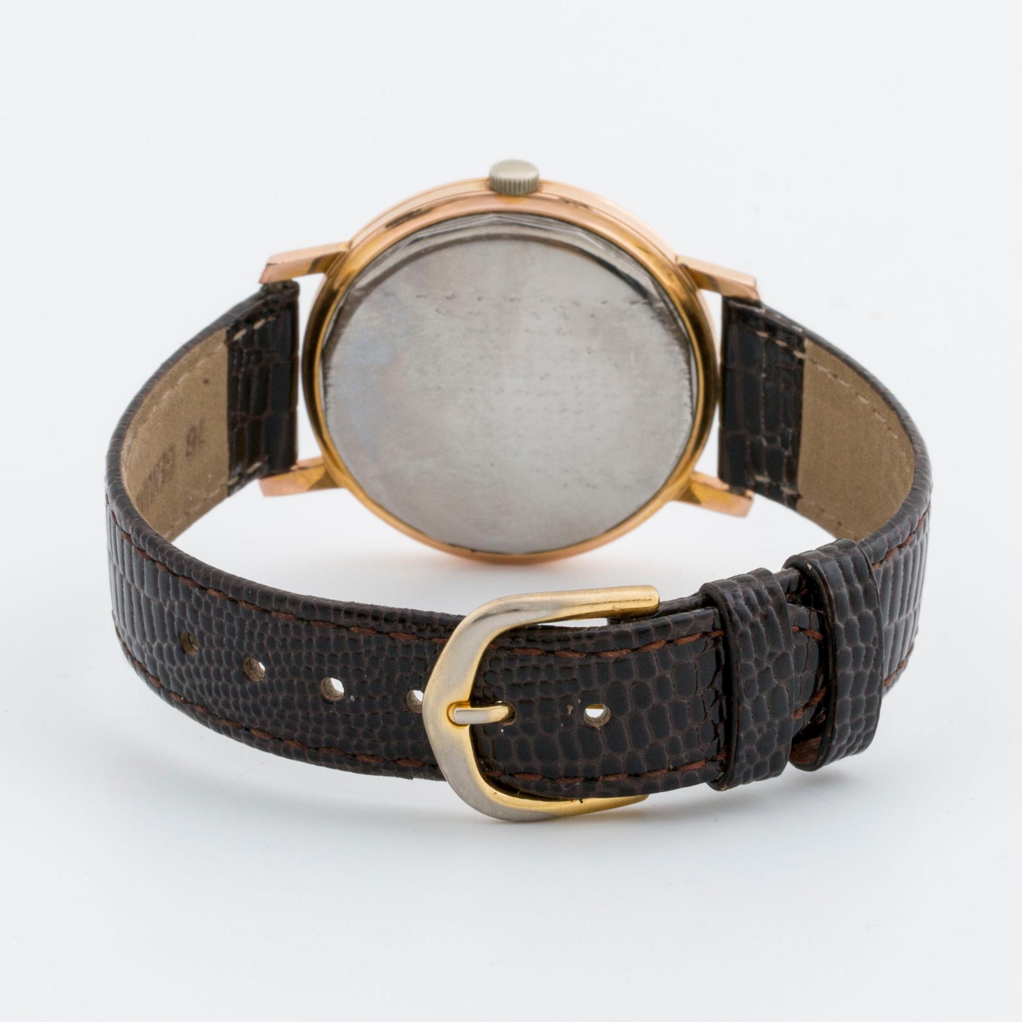 AN UNIVERSAL POLEROUTER WRISTWATCH, Geneva, 35 mm.