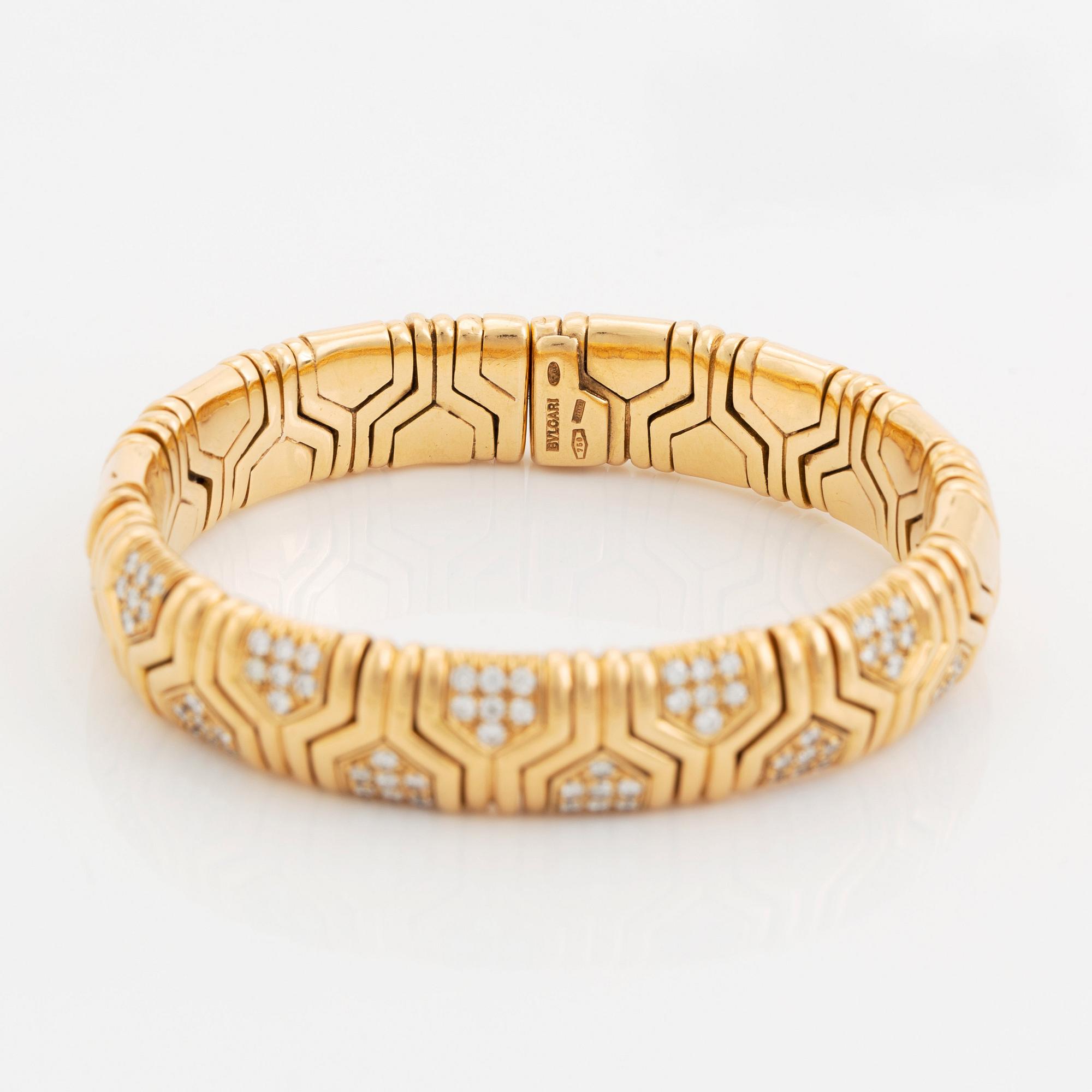 An 18K gold Bulgari bracelet set with round brilliant-cut diamonds.