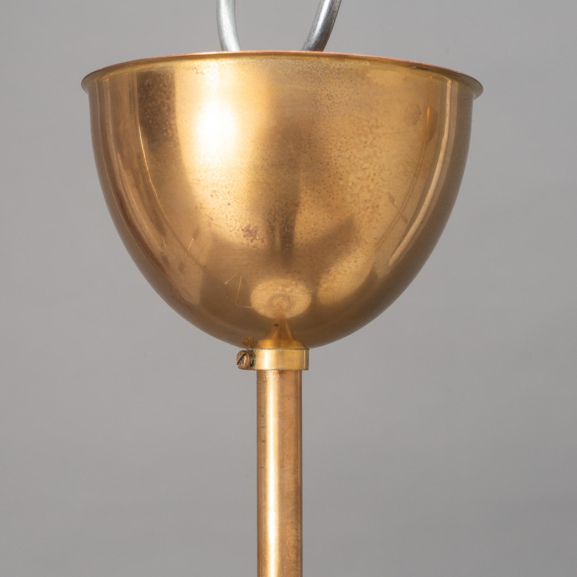 A pair of Swedish Modern ceiling lamps, mid 20th century.