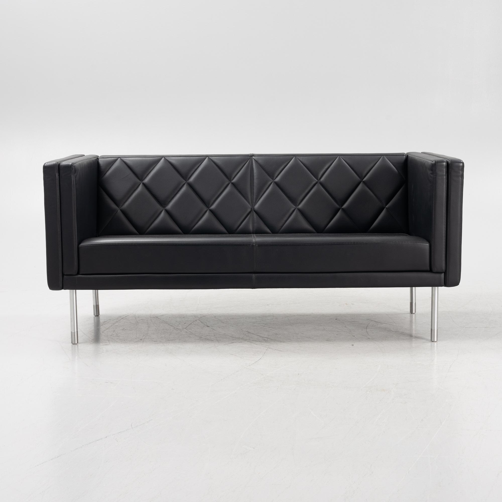 A leather upholstered sofa, 21st Century.