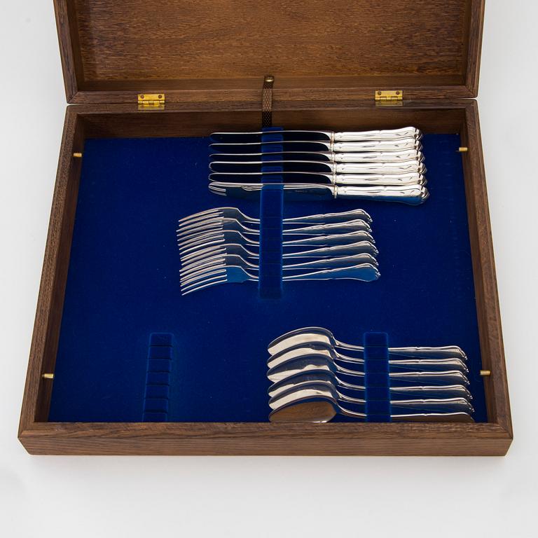 A 50-piece set of 'Chippendale' silver cutlery, Auran Kultaseppä, Turku 1989. In two original wooden boxes.