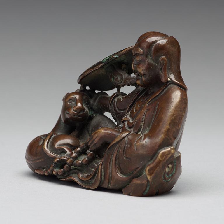 A bronze sculpture of one of the immortals, Qing dynasty, 18/19th Century.
