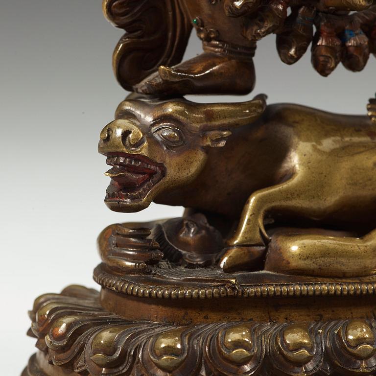 A Mongolian bronze figure of a Dharmapala, early 19th century.