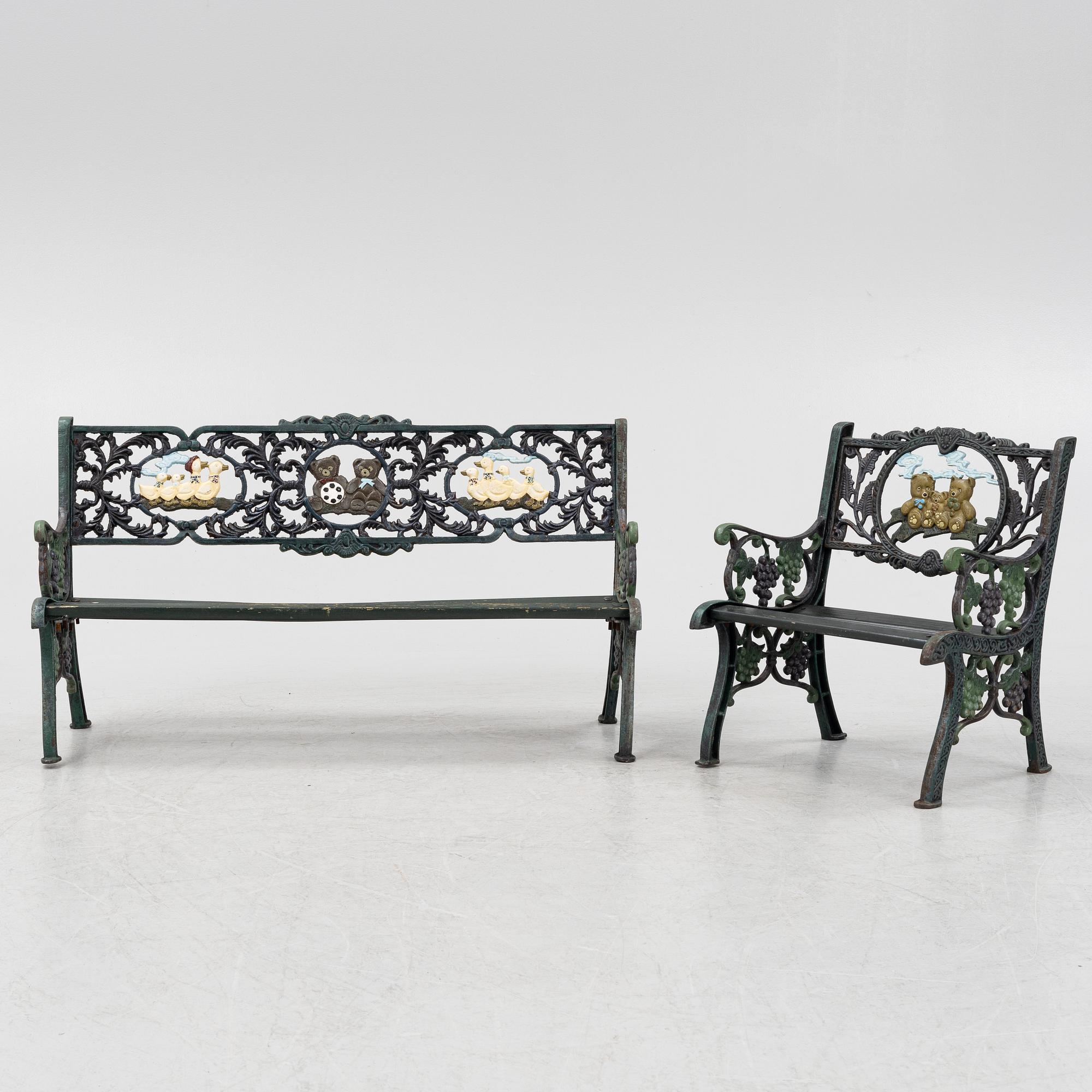 A children's cast iron garden sofa and armchair, mid 20th century.