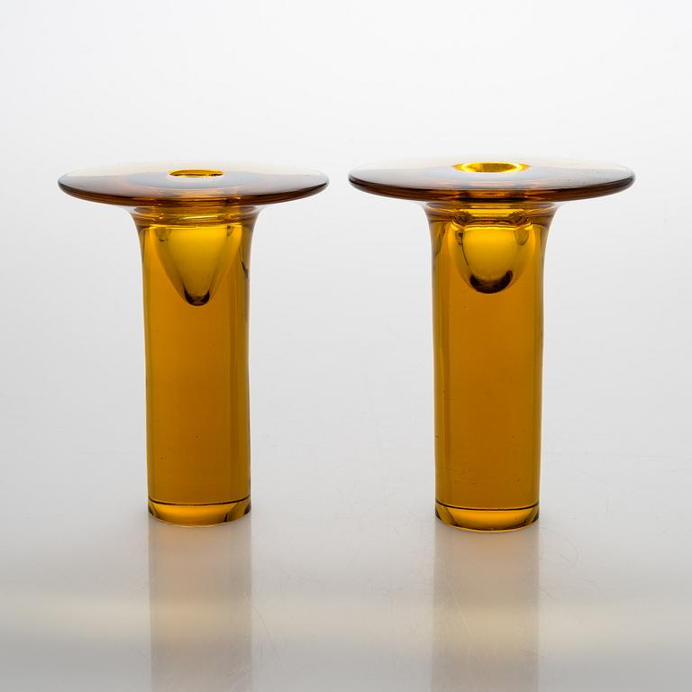 Nanny Still, A pair of 1960s 'Ambra' glass candlesticks, signed "Ambra", signed Nanny Still Riihimäen Lasi oy.