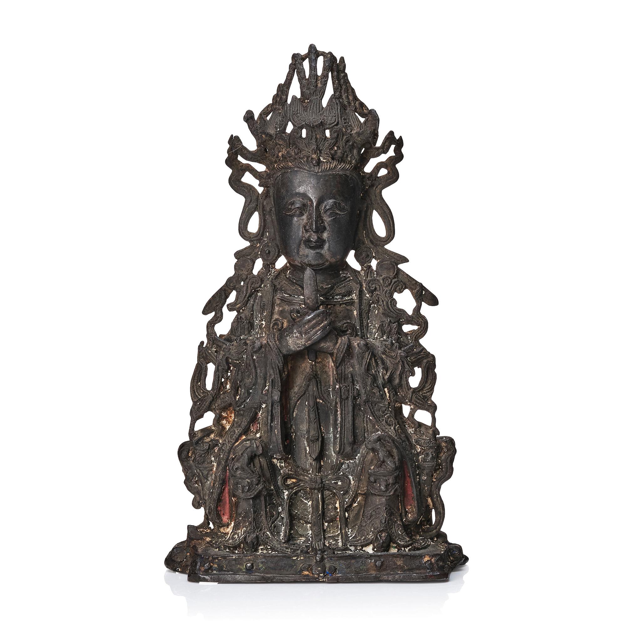 A bronze scultpure of Guanyin, Ming dynasty (1368-1644).