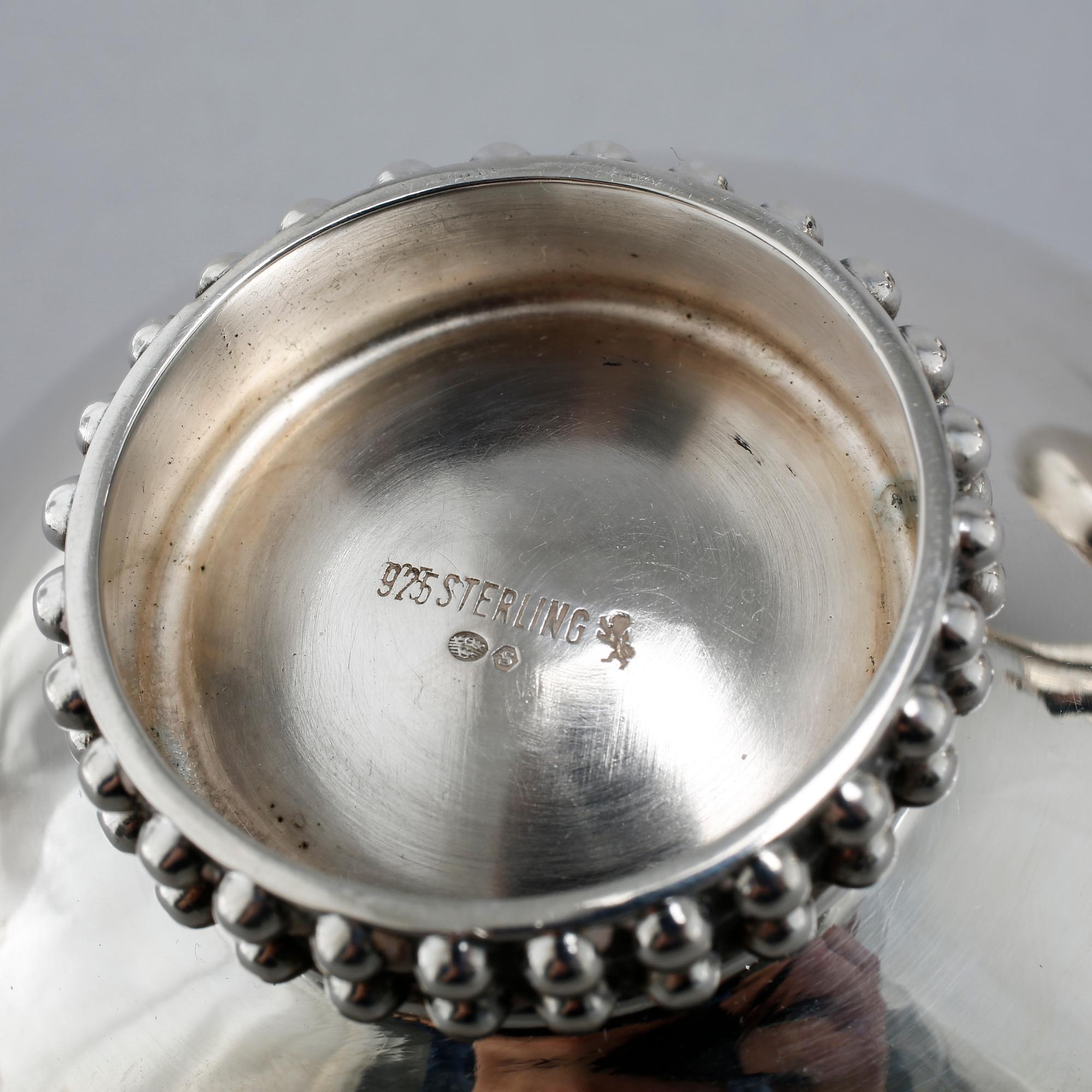 A silver coffee set of four pieces from the middle of the 20th century.