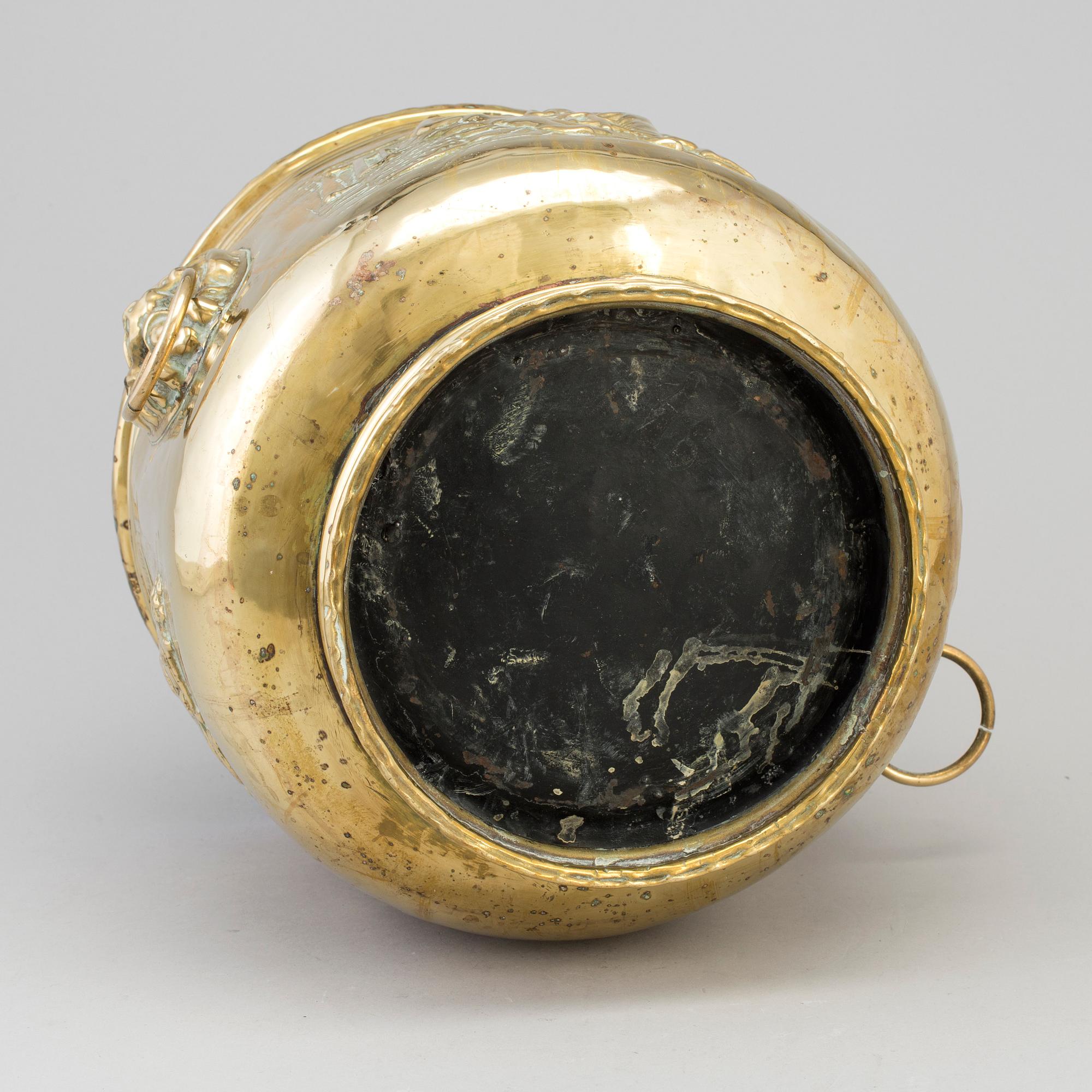 An 18th/19th century brass flower pot.